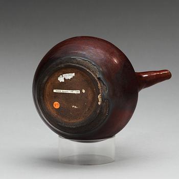 A chesnut brown glazed kendi, Yuan dynasty (1280-1368).