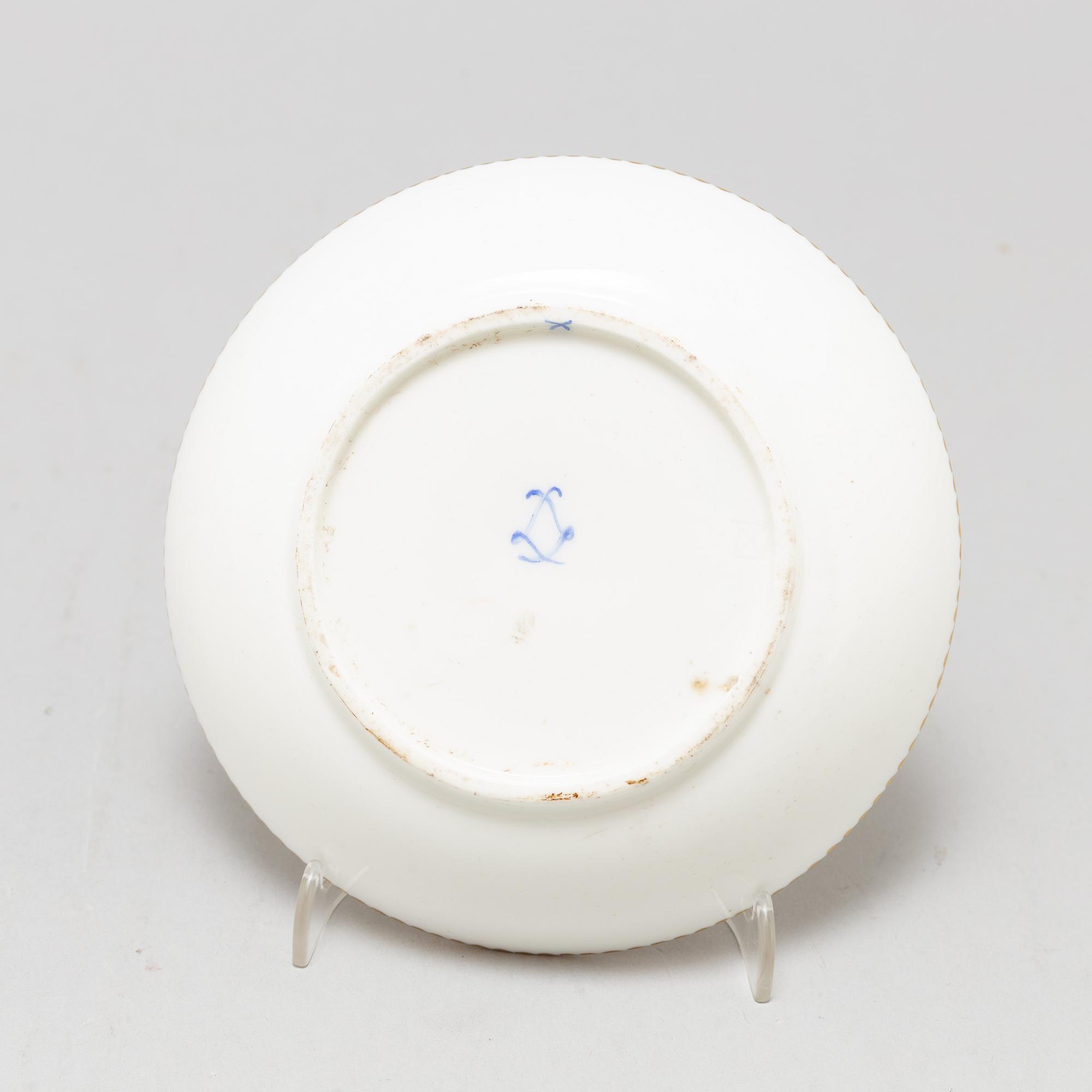 A pair of cups and saucers, "Sévrès"like mark, 19th century.