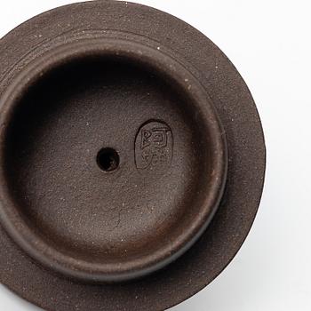 A group of four square yixing teapots, China, 1970/80s.