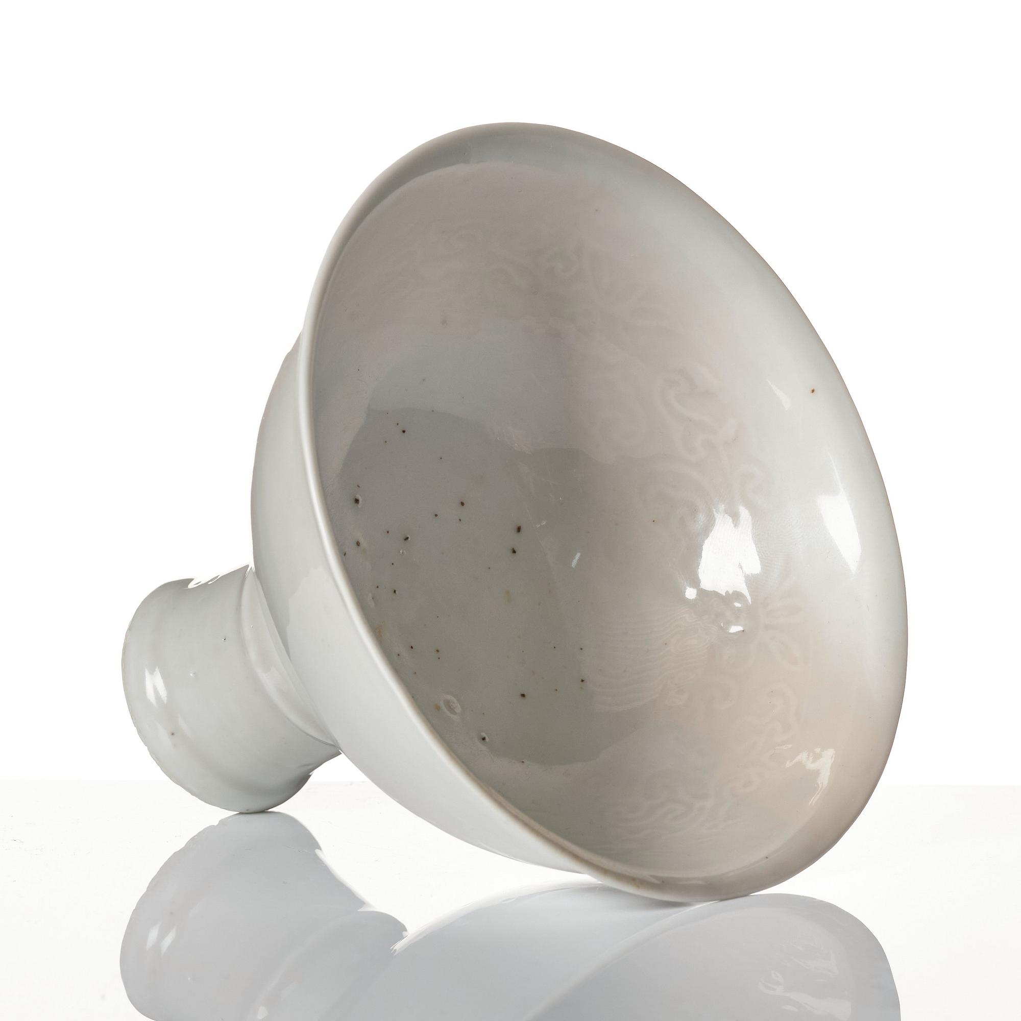 A white glazed anhua decorated stemcup, Ming dynasty (1368-1644).