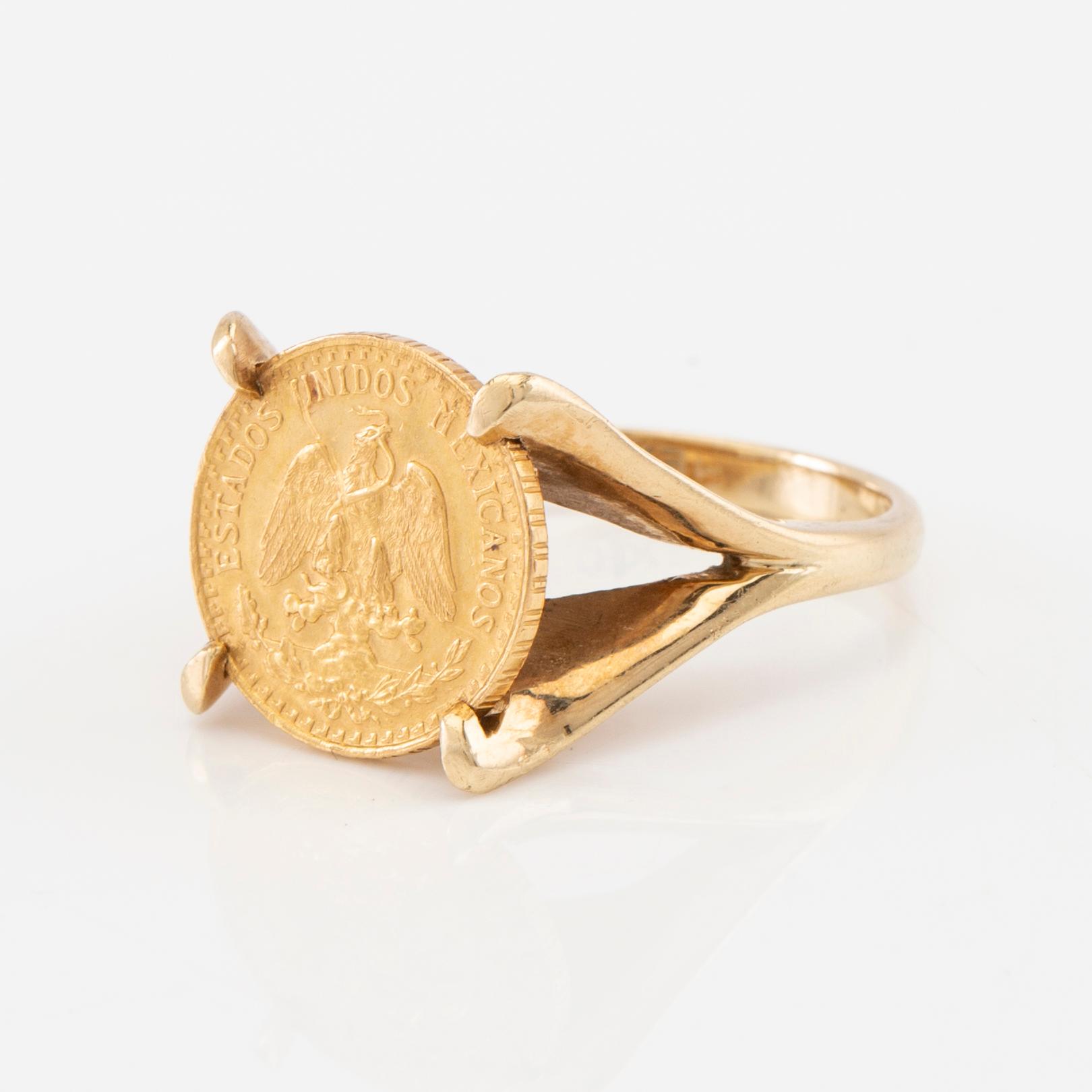 Ring in 14K gold with set coin.
