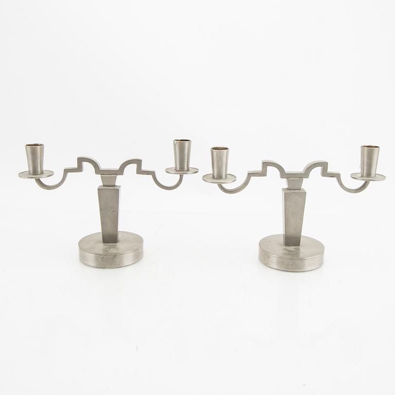 A pair of Firma Svenskt Tenn pewter candelabras 1933.