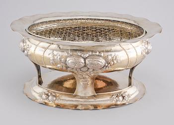 A silver jardinièr by C G Hallberg from Stockholm in 1906.