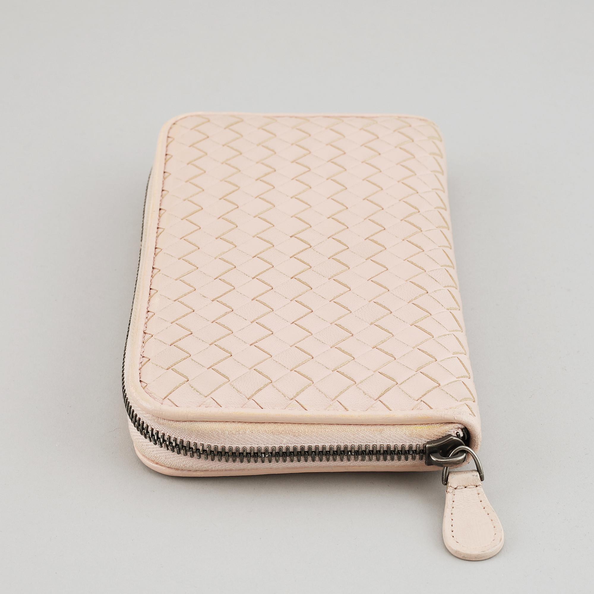 BOTTEGA VENETA, a intrecciato leather wallet.