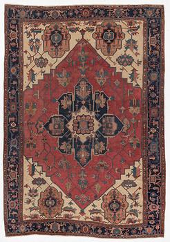 An Antique Heriz Carpet, North West Persia, c. 410 x 285 cm.