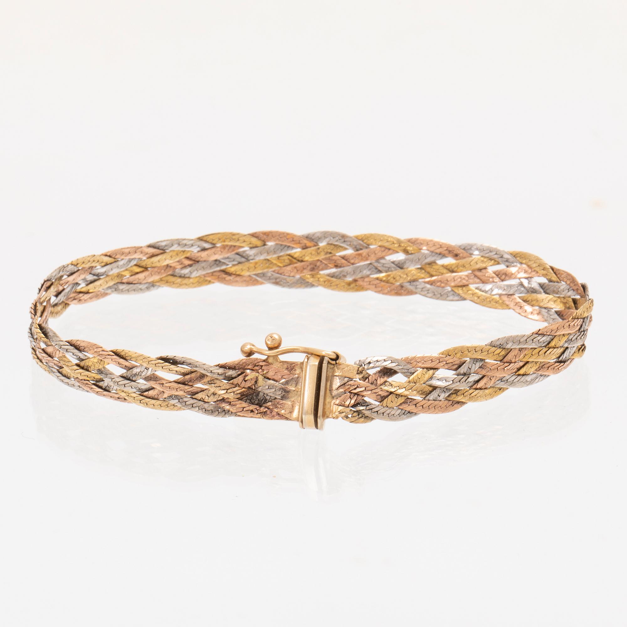 A 14K gold bracelet.