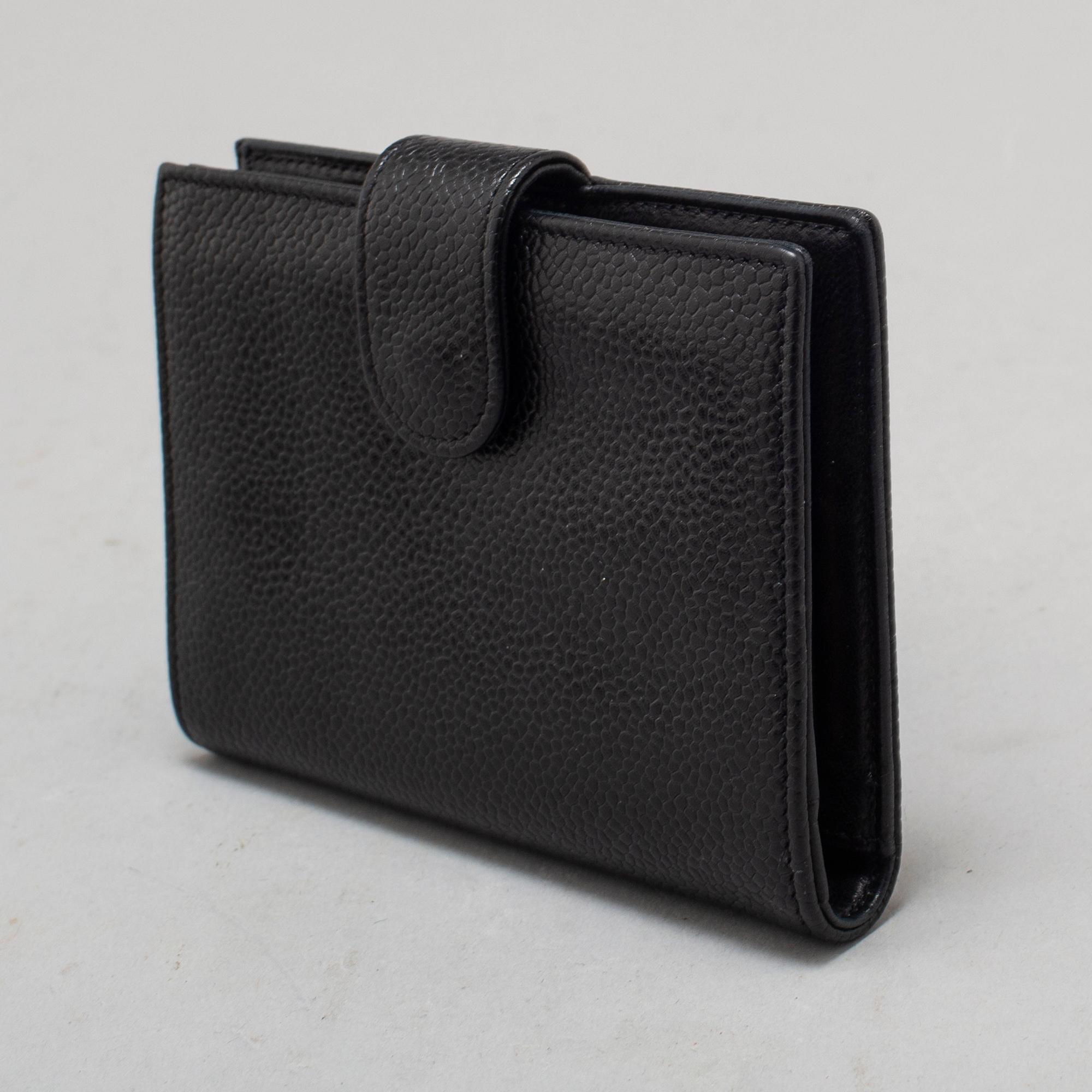 CHANEL, a caviar leather wallet, 1997-9.