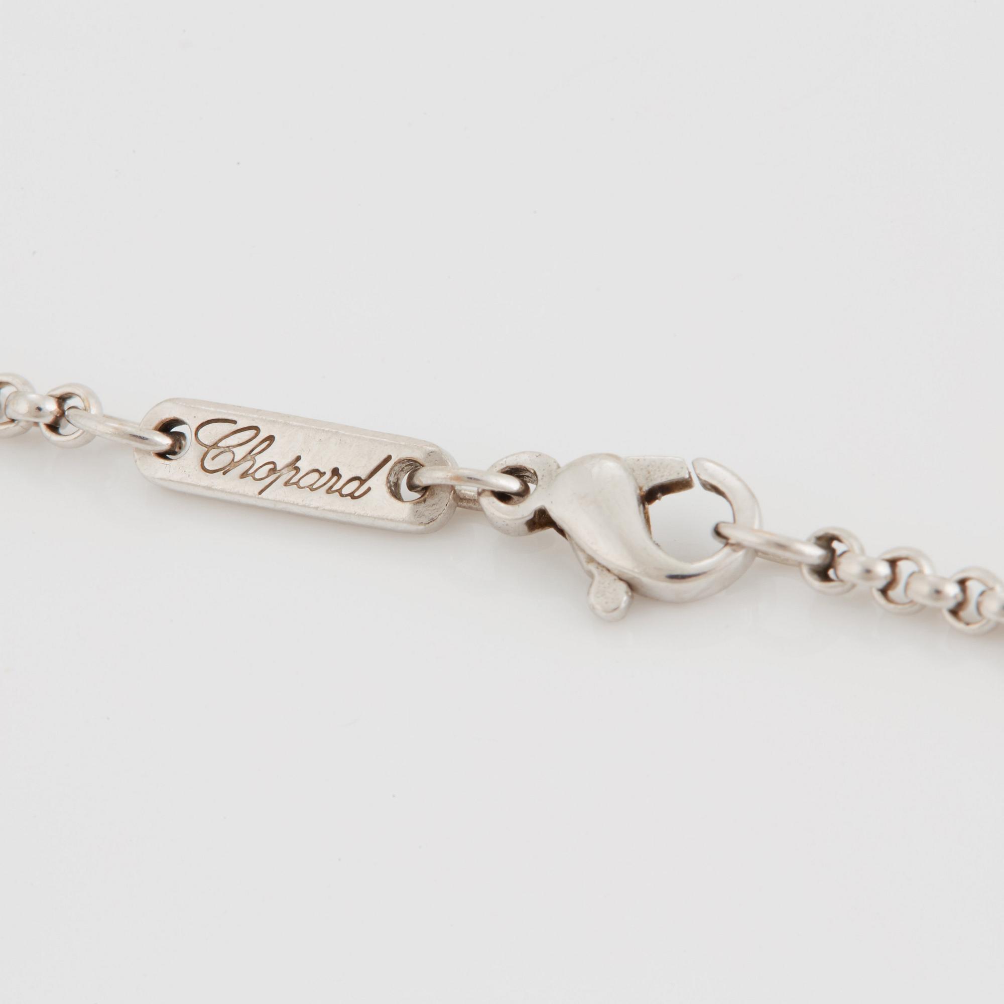 A Chopard "Happy diamonds" pendant in 18K white gold with round brillliant-cut diamonds.