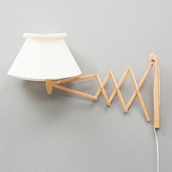 ERIK HANSEN, a model 223-2/17 wall lamp, Le Klint, Denmark.