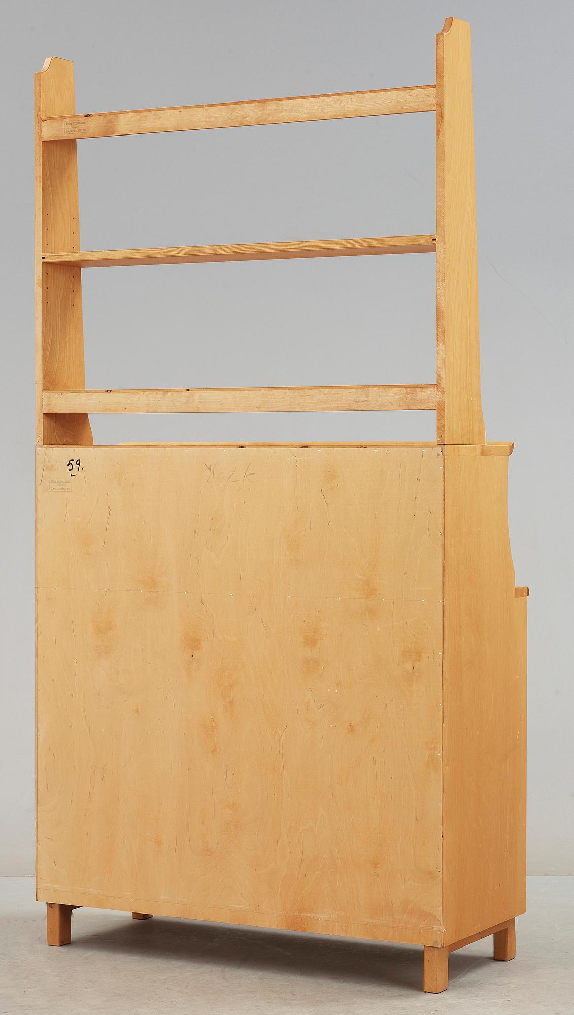 SKÅP MED HYLLA. Carl Malmsten, Åfors Möbelfabrik.