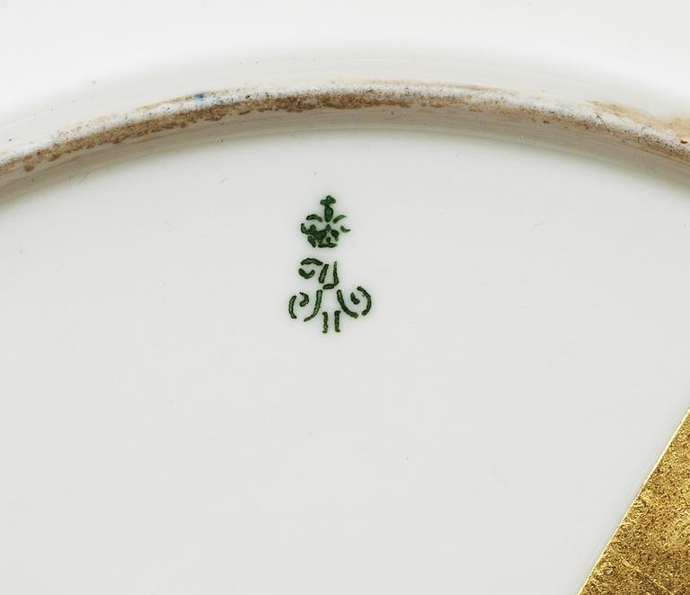 A Russian part dinner service, Imperial porcelain manufactory, St Petersburg, period of Emperor Nicholas I and Alexander II. (14 pieces).