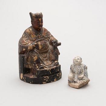 TWO FIGURINES, one possibly Chinese 19th Century and the other possibly 14th-15th Century Southeast Asian.