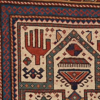 A RUG, an antique Caucasian prayer rug, Czar Russia, ca 144-151 x 103-106 cm.
