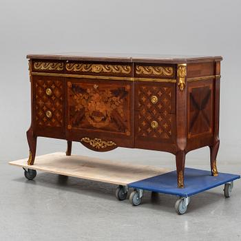 A Gustavian style chest of drawers signed and dated Isidor Hörlin 1917.