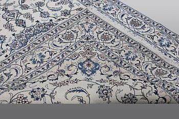 A carpet Nain, part silk, ca 290 x 196 cm.