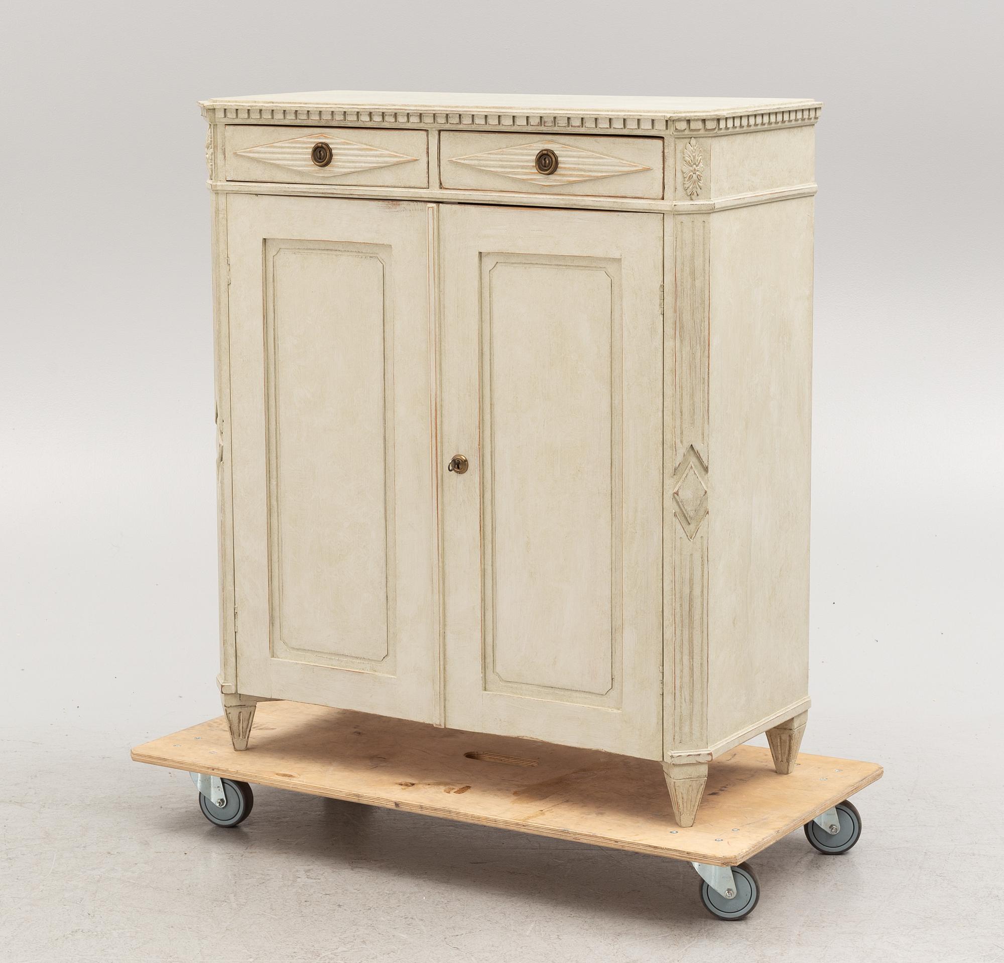 A Gustavian Style Cabinet, 19th Century.