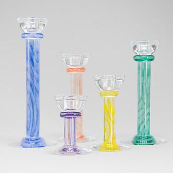 A set of five glass candlesticks by Kjell Engman för Kosta Boda.