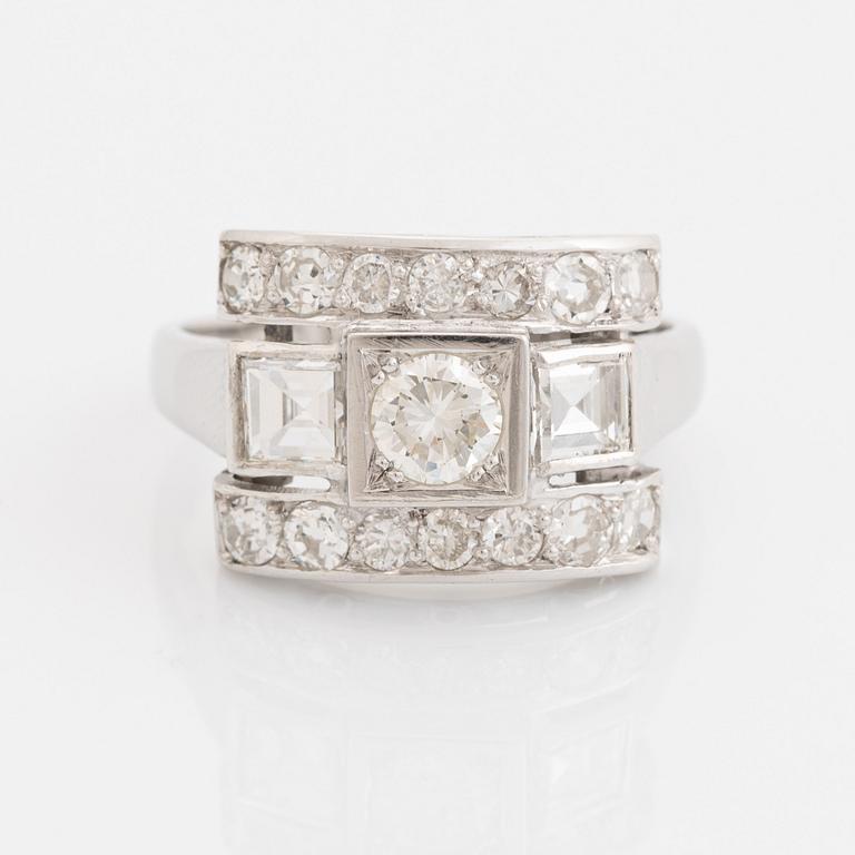 Brilliant-cut, old-cut brilliant and step-cut diamond ring.