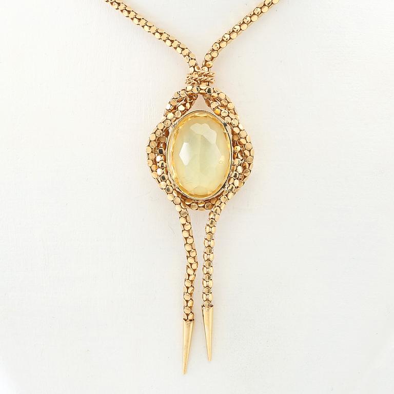 Necklace 18K gold with an oval faceted green synthetic spinel.