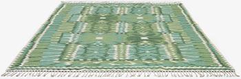 Barbro Nilsson, a carpet, 'Strålblomman grön', tapestry weave, c. 316 x 232 cm, signed AB MMF BN.