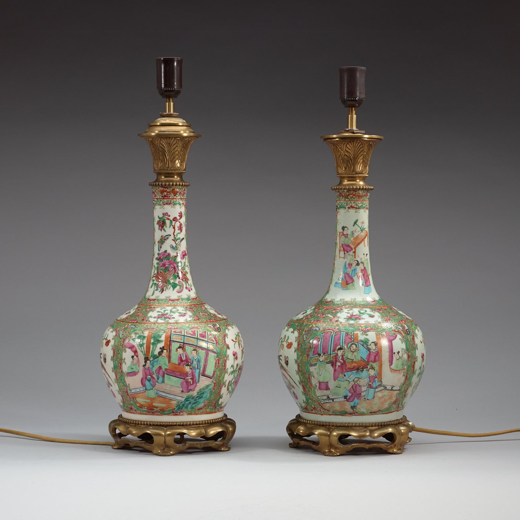 A pair of Canton famille rose lamps / vases, Qing dynasty, 19th century.