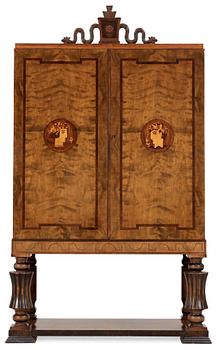 A Gösta Thorell Swedish Grace cabinet in stained birch, palisander, mahogany and other wood inlays, Stockholm 1930.