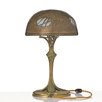 A bronze and brass table lamp, with signature Georges Leleu.