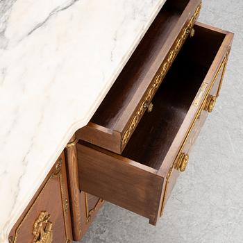A chest of drawers, Louis XVI style, mid 20th Century.