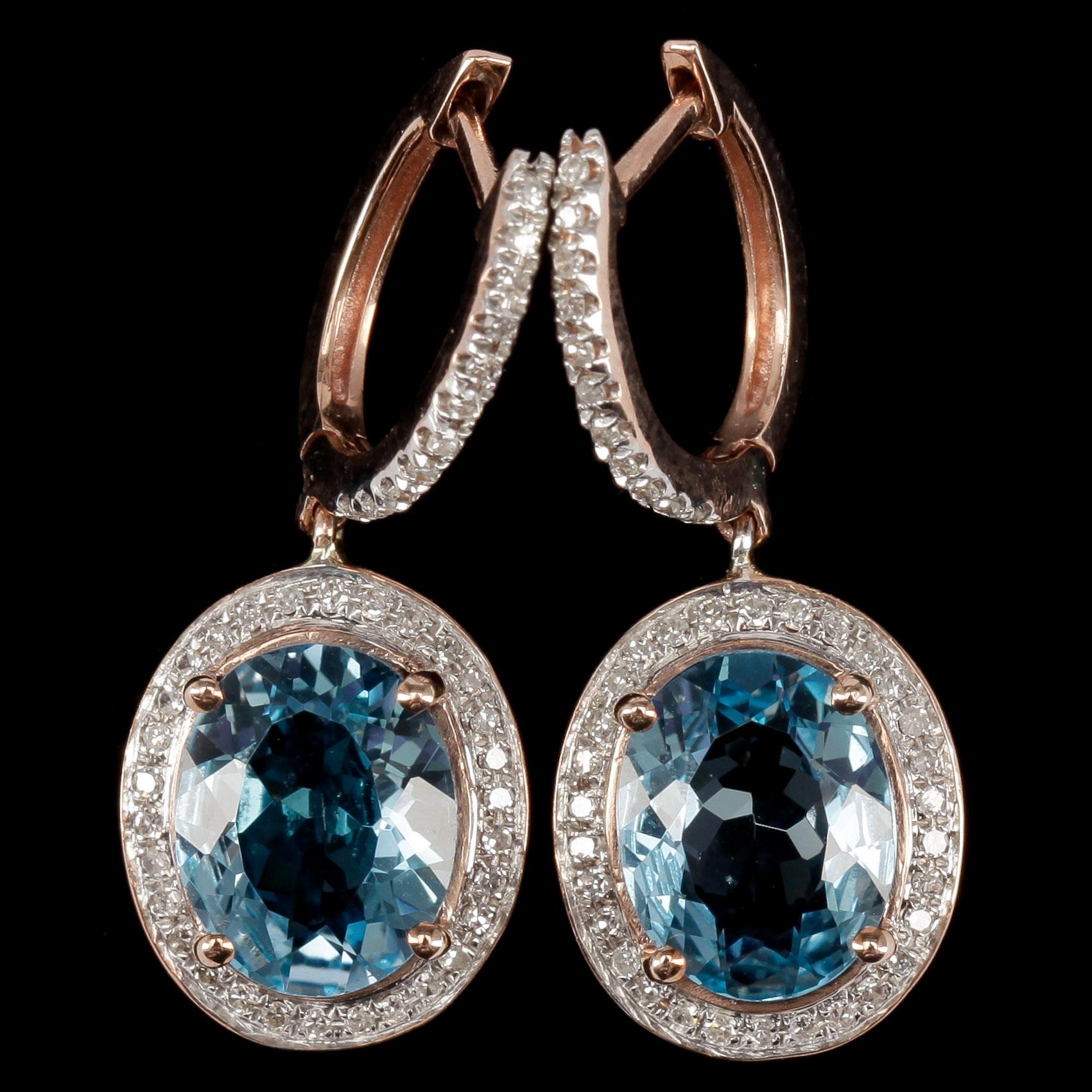 ÖRHÄNGEN, ett par 14k roséguld m blå topas tot ca 5ct och kransar av små briljantslipade diamanter. Tot vikt ca 5,2 g.