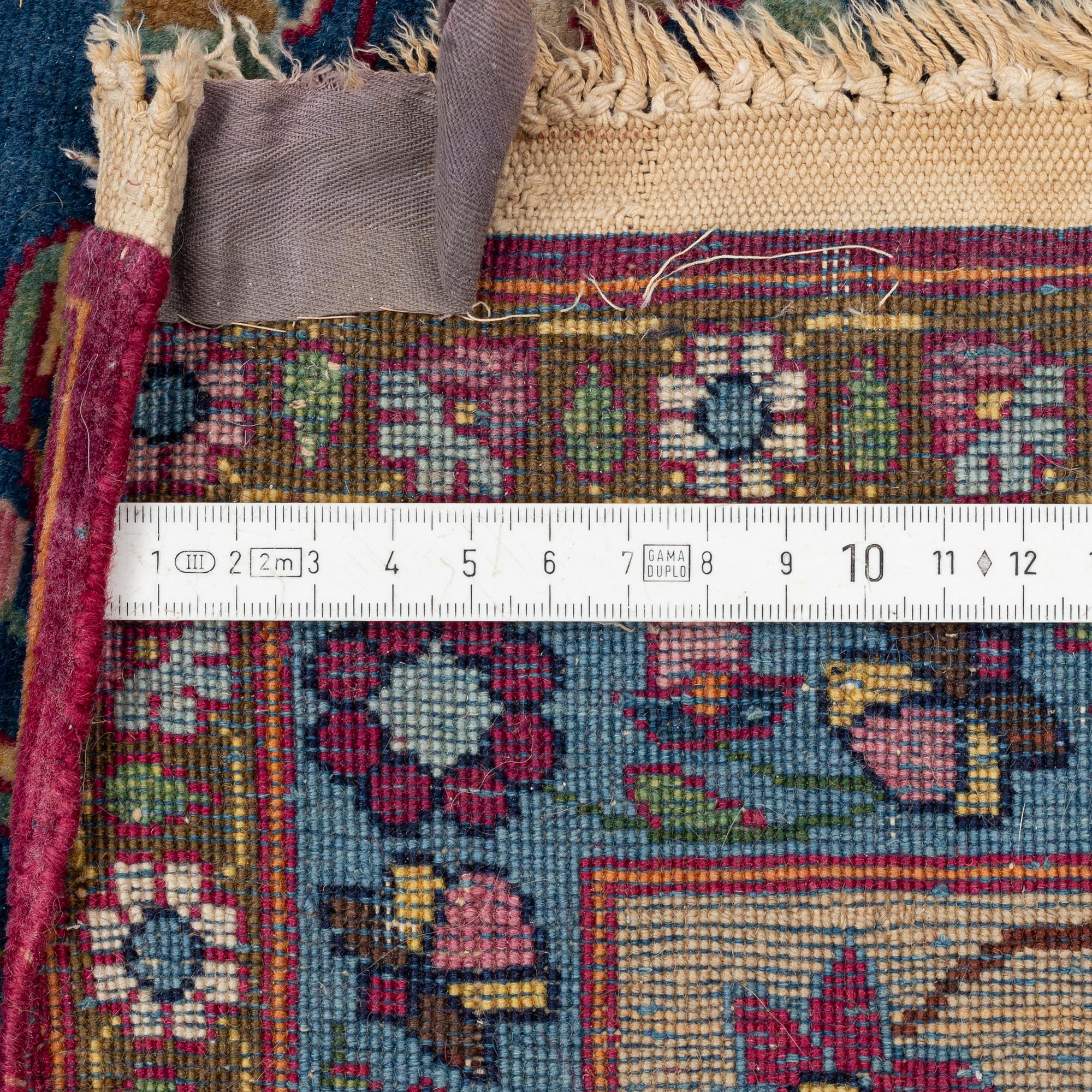 Rug, likely Tehran, approximately 227 x 133 cm.