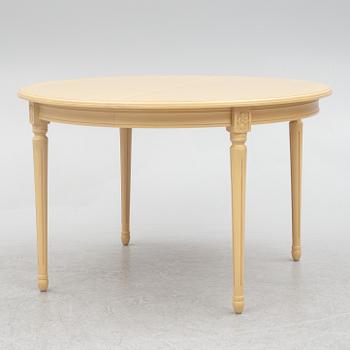 A Gustavian style dining table with six dining chairs, Sweden, 21st century.