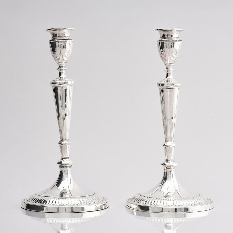 A pair of 18th century silver candlesticks, marks of John Parson & Co, Sheffield 1791.
