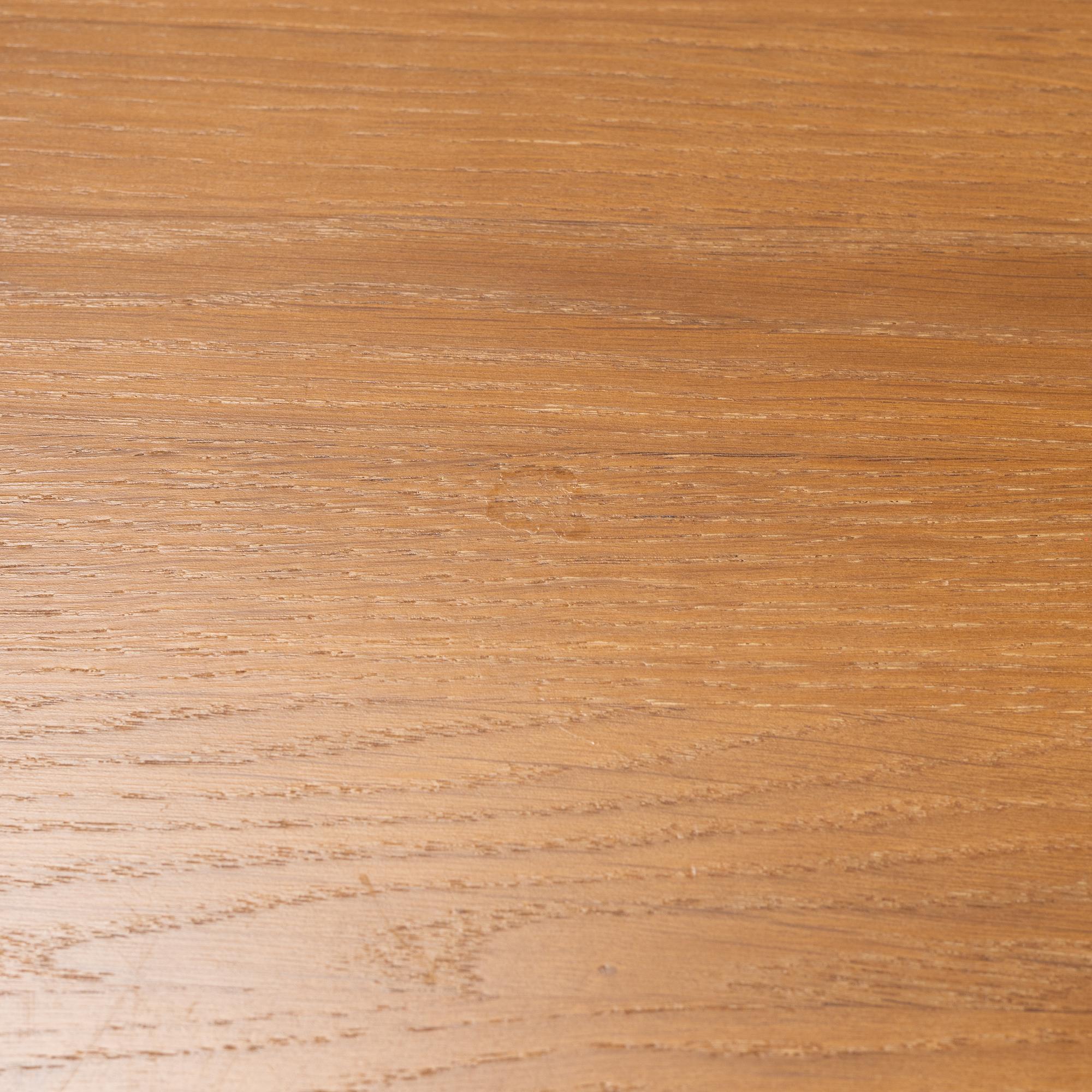 Jonas Lindvall, a stained oak dining table for Stolab.