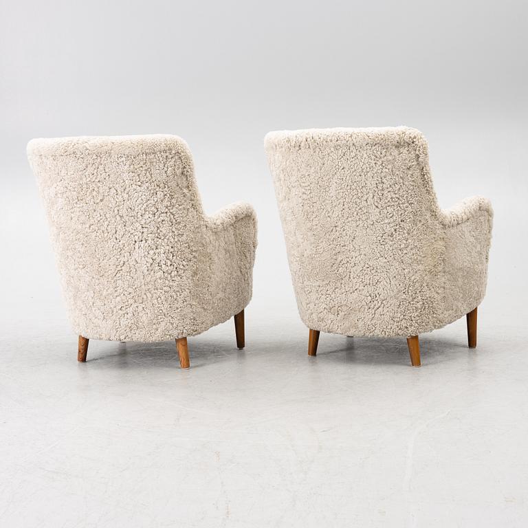 Carl Malmsten, A pair of Samsas easy chairs, second half of the 20th century.
