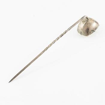 A brooch, a brooch pin, and a pendant, likely 19th century.