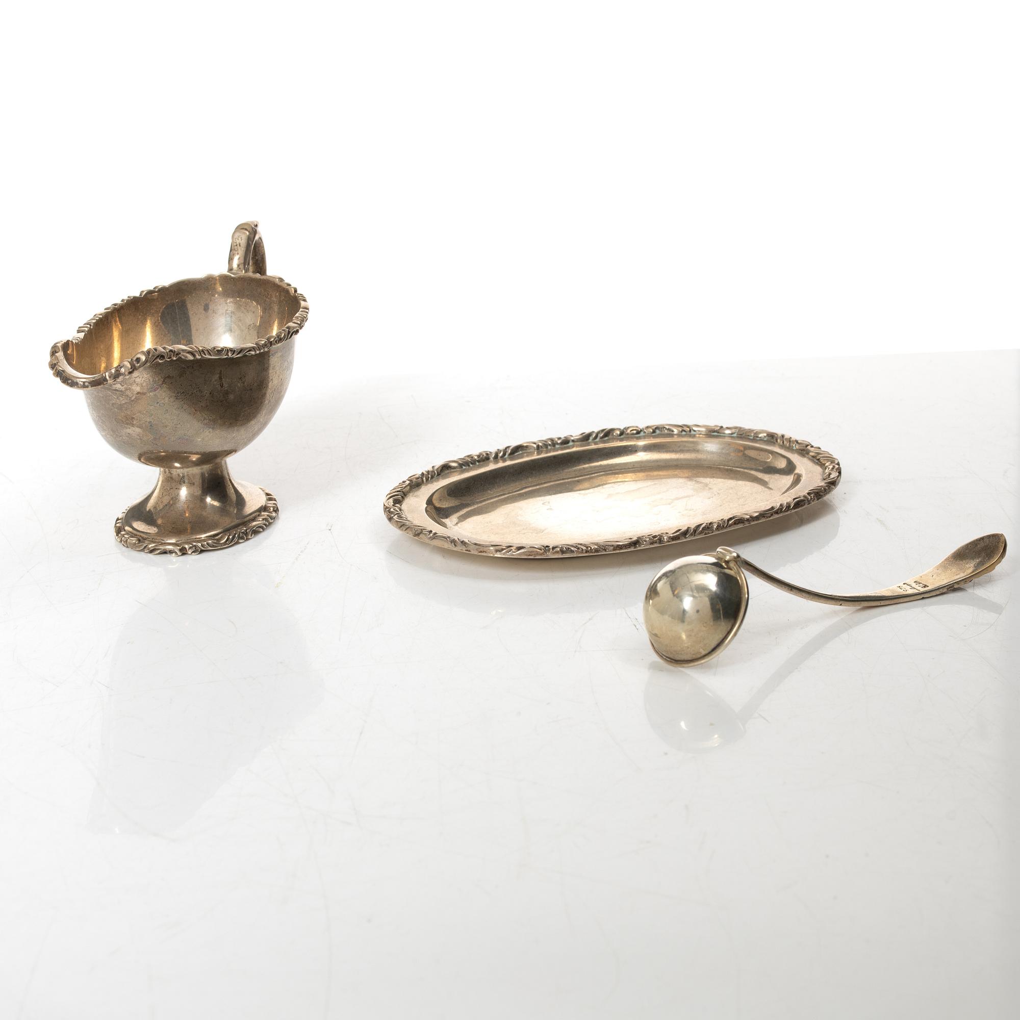 A silver sauceboat with tray and spoon, Anaya, Mexico, second half of the 20th Century.