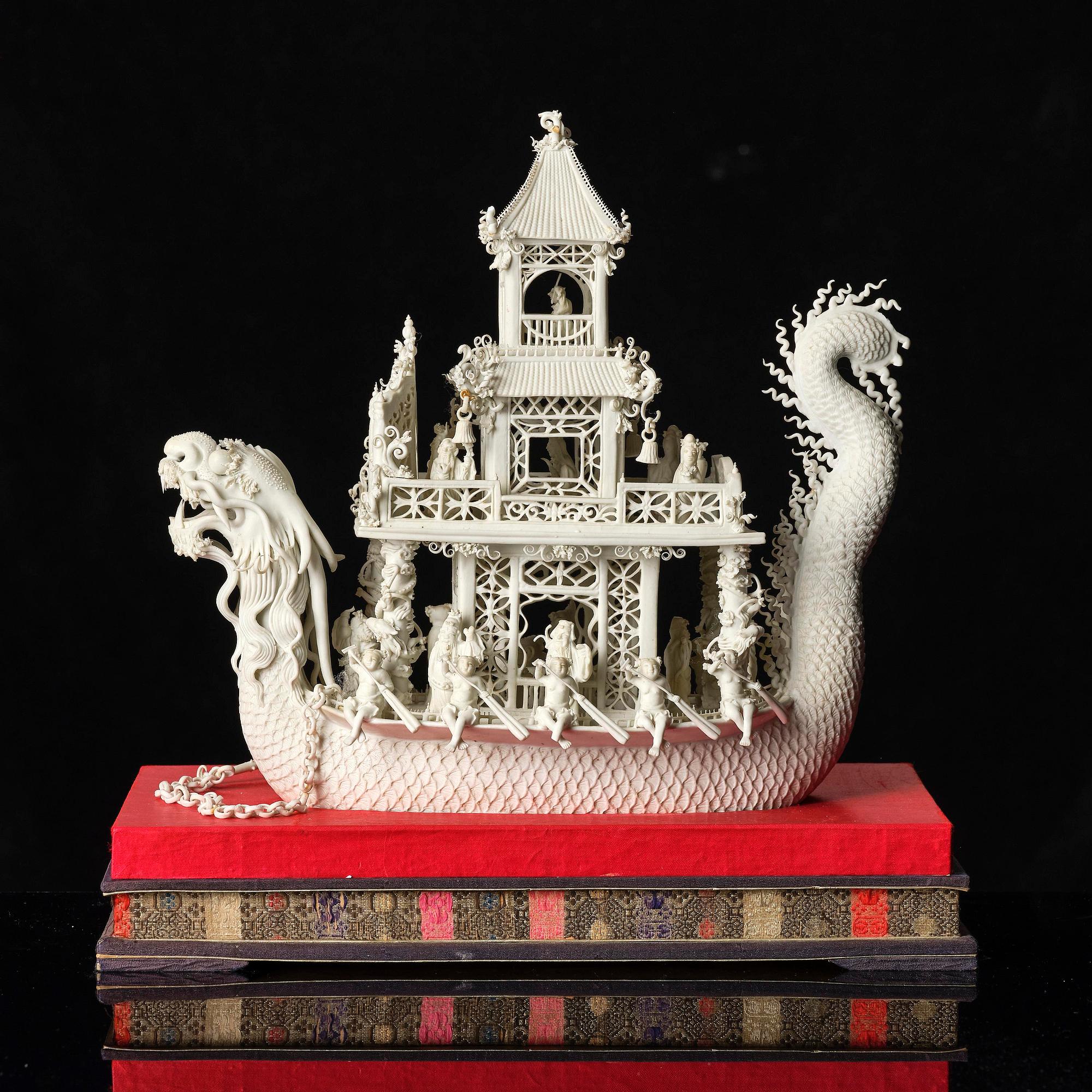A white biscuit Dragon Boat, Qing dynasty, 19th Century.