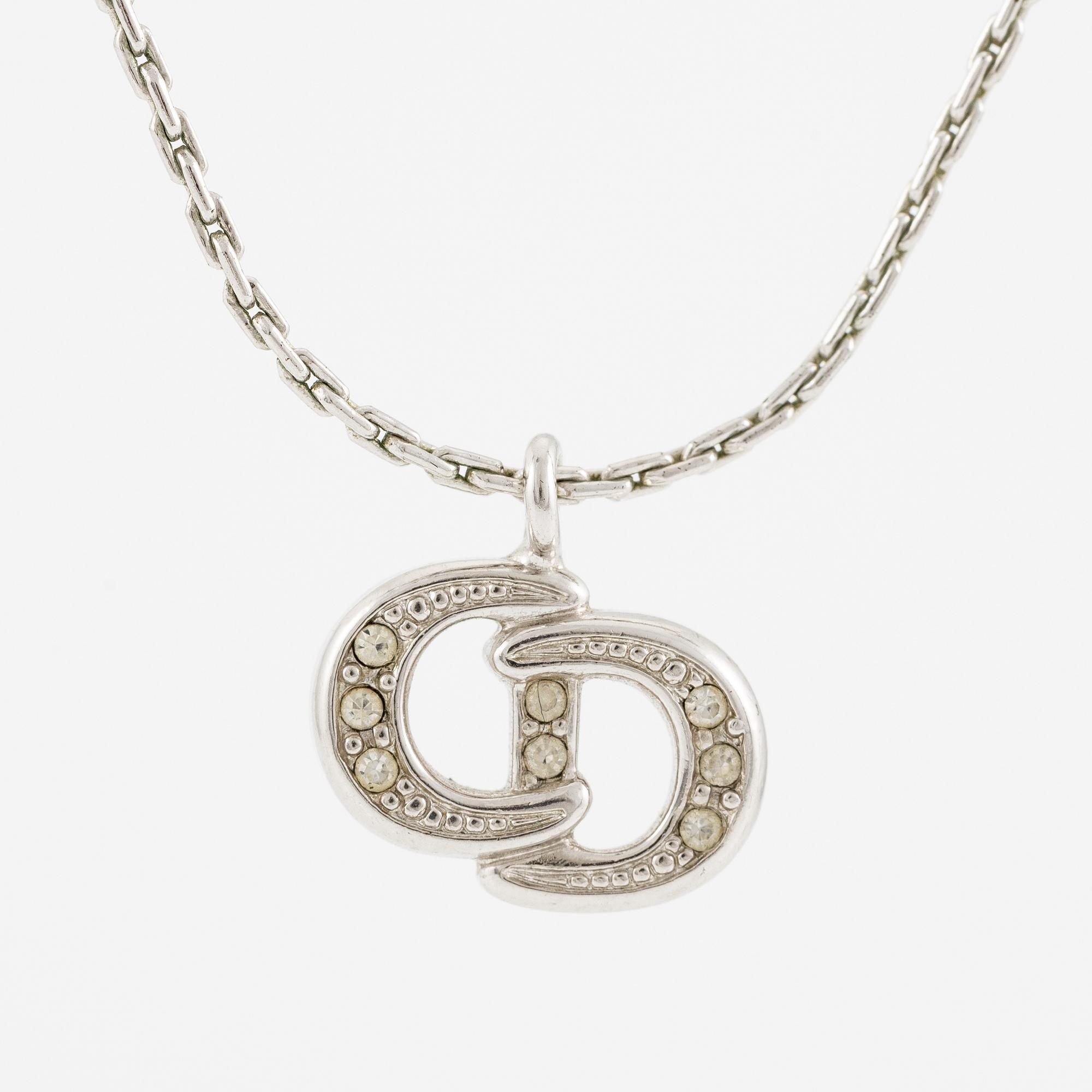 Christian Dior, örhängen, ett par och collier med hänge.