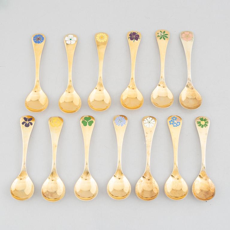 Georg Jensen, Christmas spoons/annual spoons, 13 pcs, gilded silver, Denmark 1971-1983.