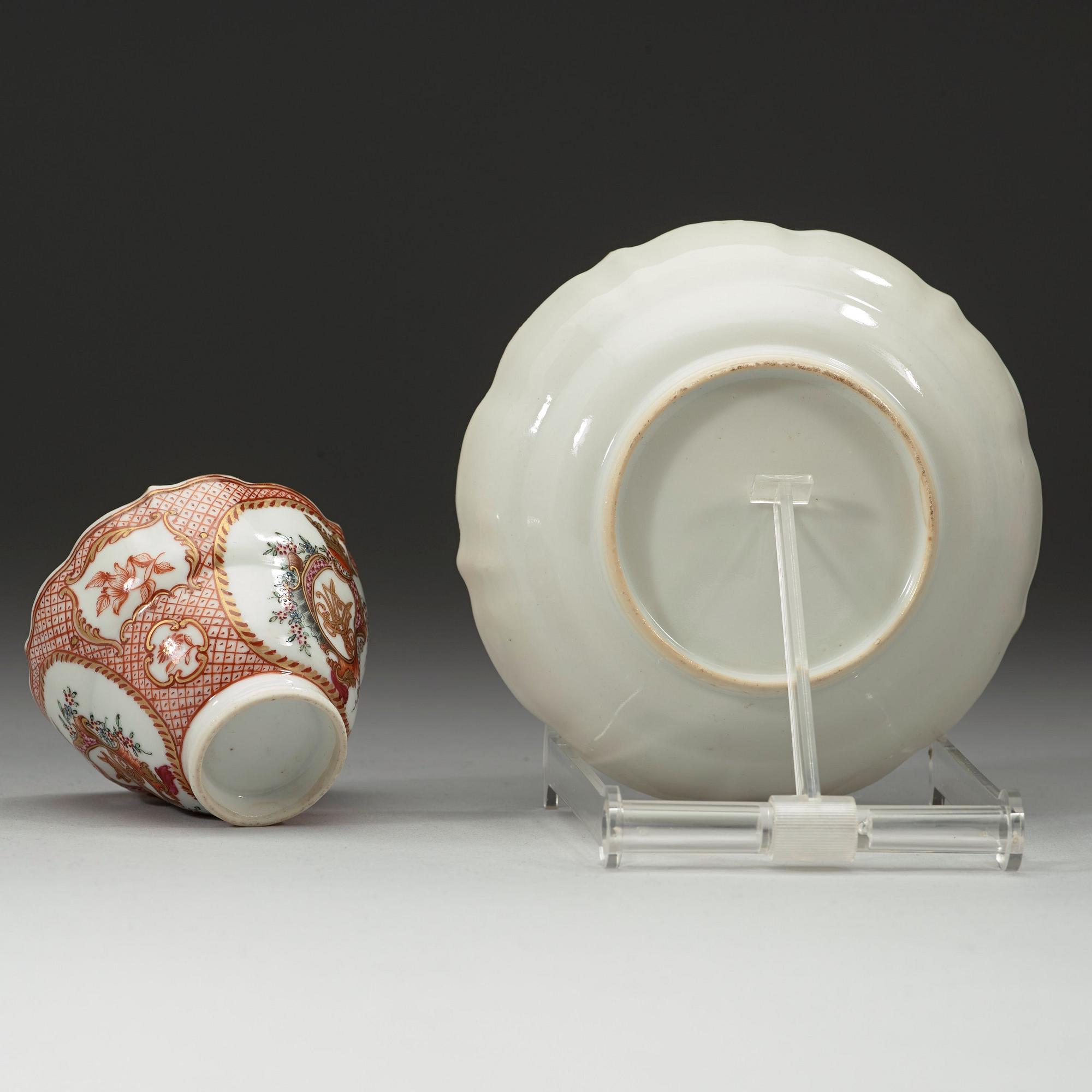A export cup and saucer with a crowned cartush and monogram in famille rose, Qing dynasty Qianlong (1736-1795).