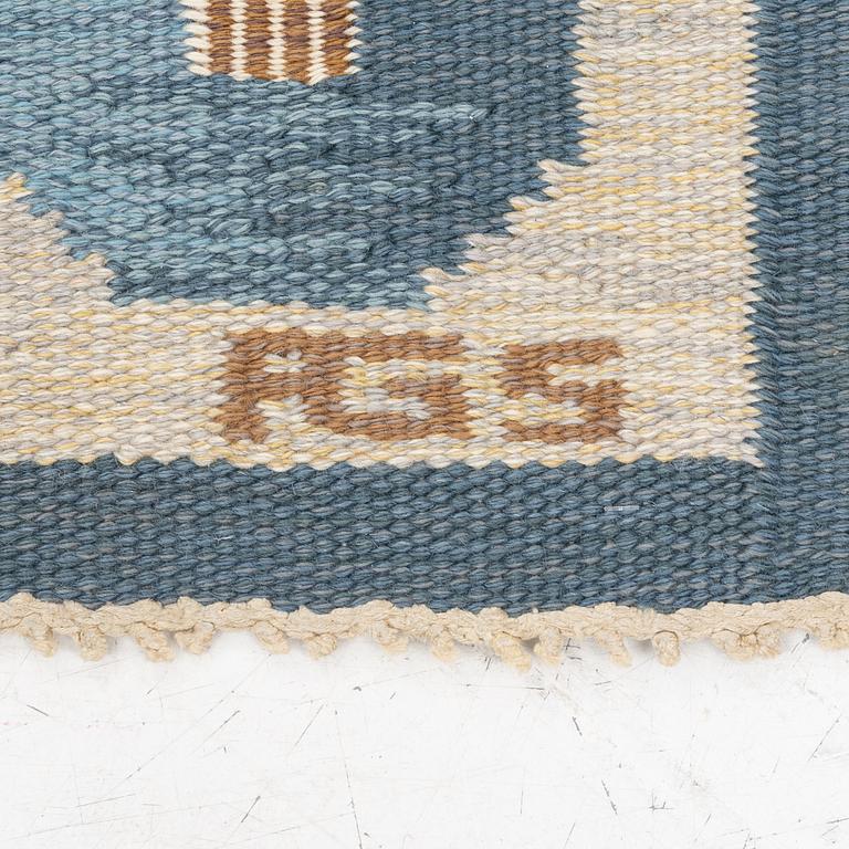 A flat weave carpet by Anna-Greta Sjöqvist c 223 x 144 cm, signed AGS.