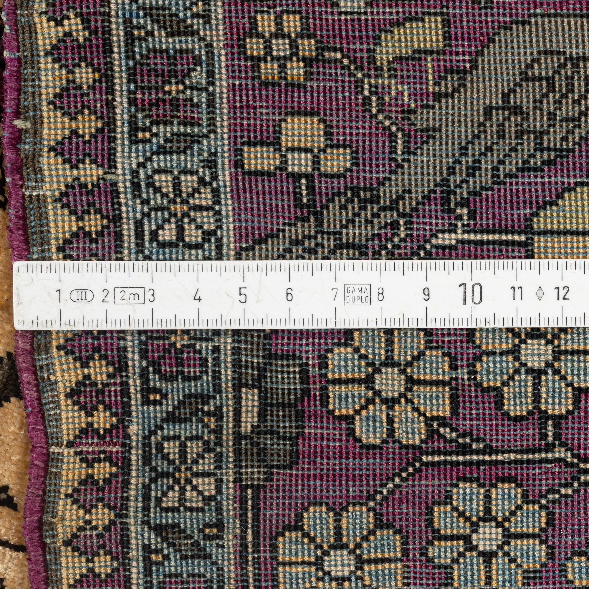 A pictoral silk Kashan 'Mohtasham' rug, c. 195 x 130 cm.