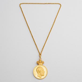 The Royal Illis Quorum medal in gold with chain awarded to Ludvig Berckhan Falkman.