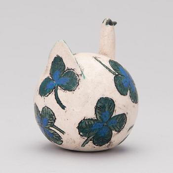 A ceramic bird signed Kaipiainen.