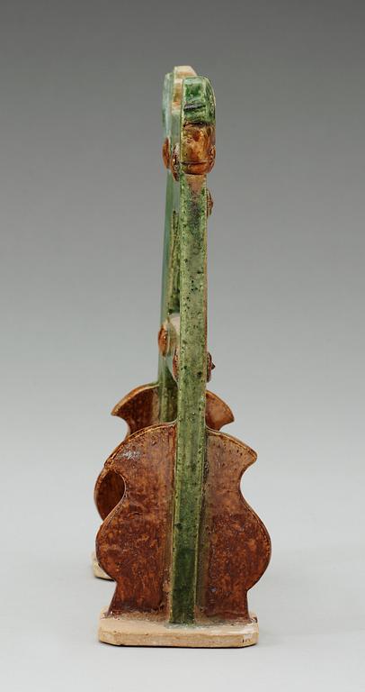 A green and brown glazed pottery stand/gate, Ming dynasty (1368-1644).