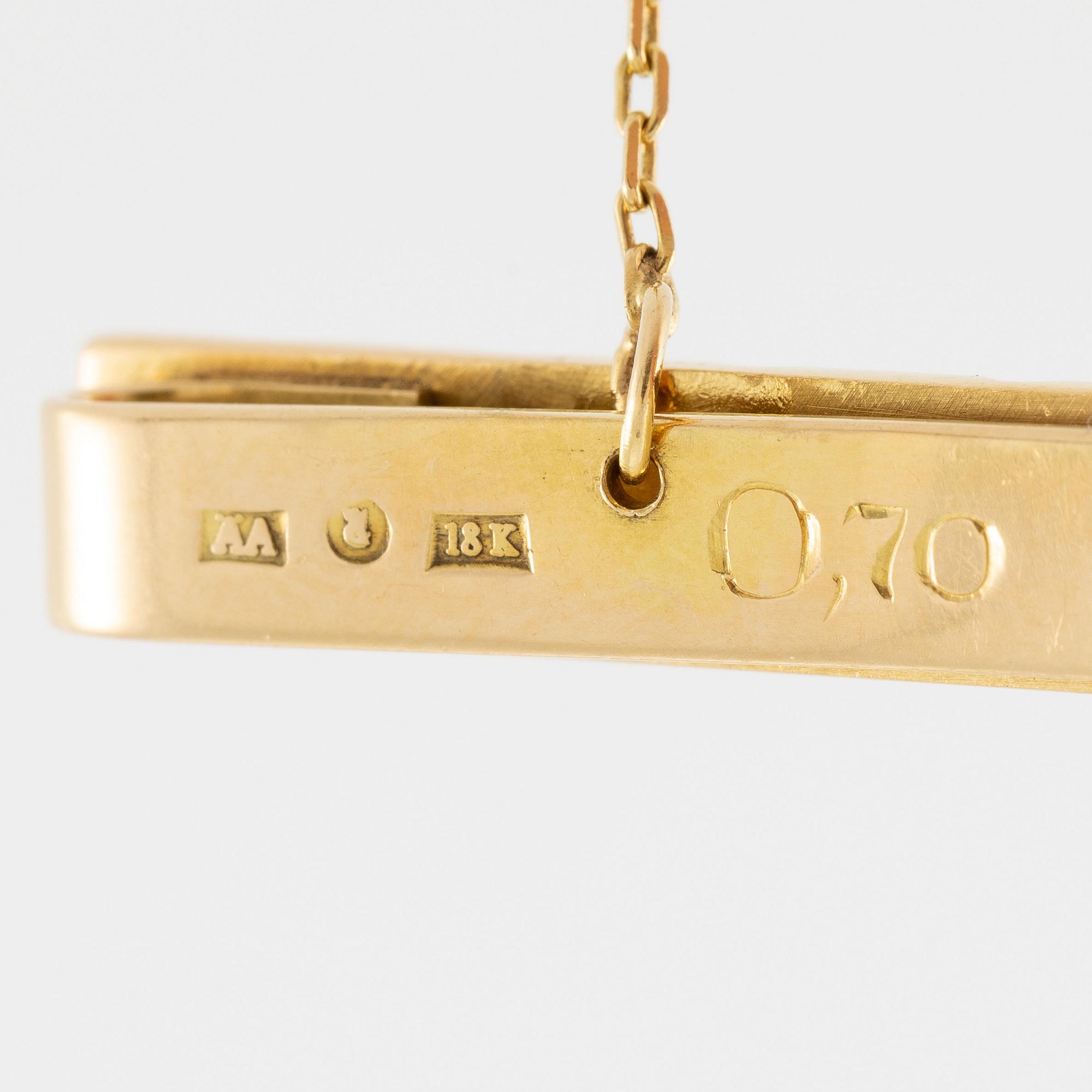 Tie pin 18K gold with a round brilliant-cut diamond, 0.70 ct according to engraving.