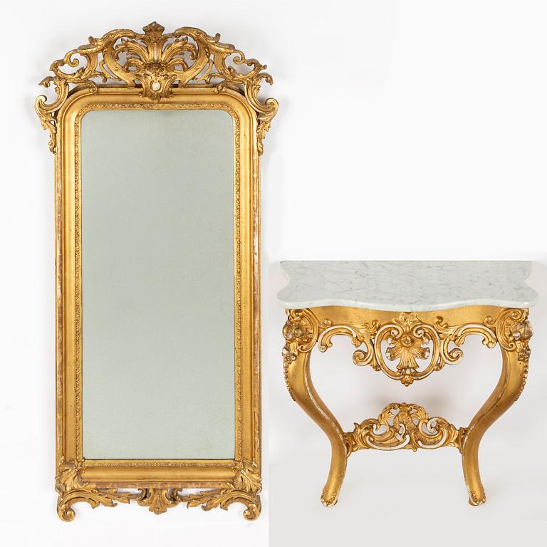 A Rococo revival mirror and a console table, second half of the 20th Century.