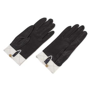 A pair of black-and white leather gloves by Chanel.