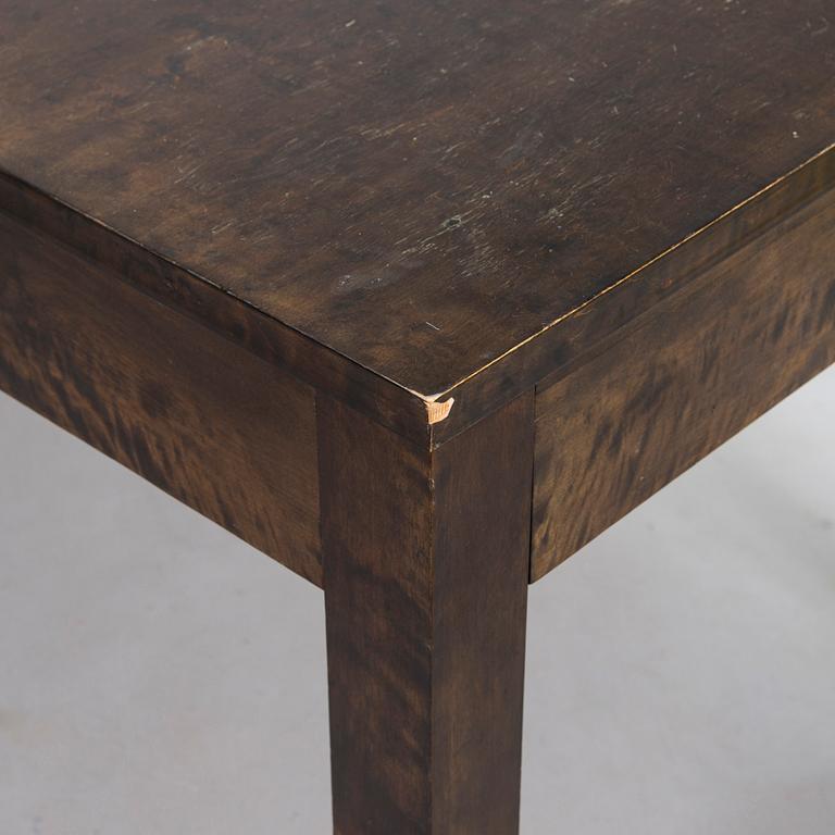 A Finnish 1930s dining table and eight chairs.