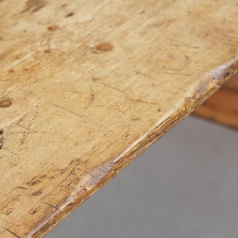 A pine trestle table, 20th century incorporating older elements.